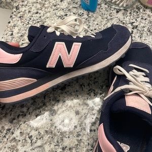 Size 8.5 New Balance 515’s baby pink and navy blue. Hardly worn.
